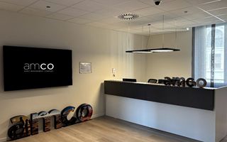 AMCO, Fitch migliora il rating special servicer