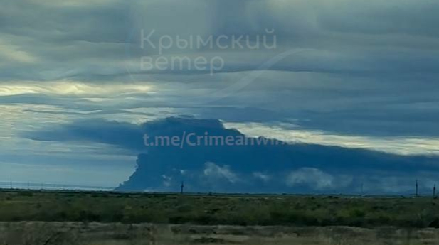 Fire burns for second day at Feodosia oil terminal after drone strikes on Crimea, smoke seen 25 km away