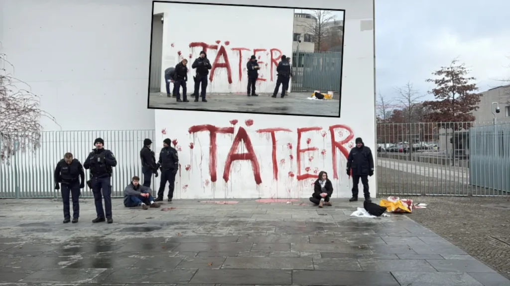Attivisti scrivono Failler sul muro del Palazzo del Primo Ministro a Berlino